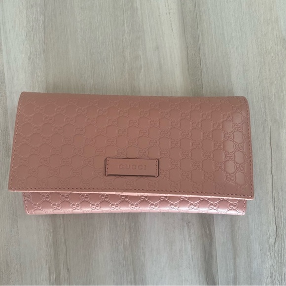 Gucci Handbags - GUCCI Leather Embossed Wallet